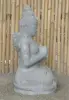 Product image 5 of the product “Seated Dewi Sri, position chakra turning the wheel, 73cm high riverstone grey, model with sativa. There is a stone eye on the left temple. ”